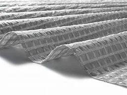 Reinforcing Slopes and Embankments Over Soft Ground: Why a Geocomposite Beats a Bare Geogrid